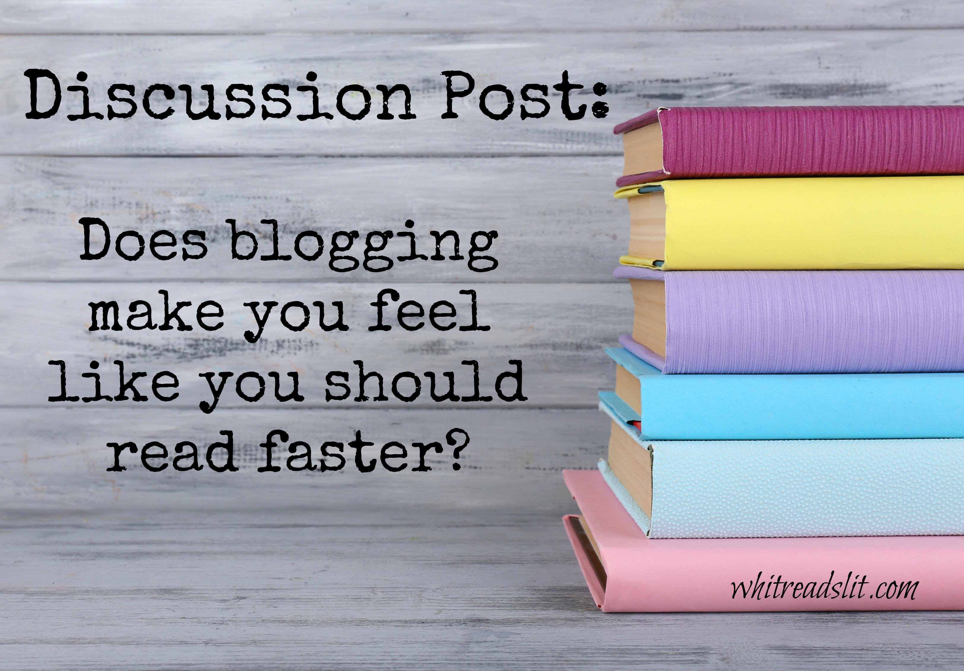 color books on grey wooden background