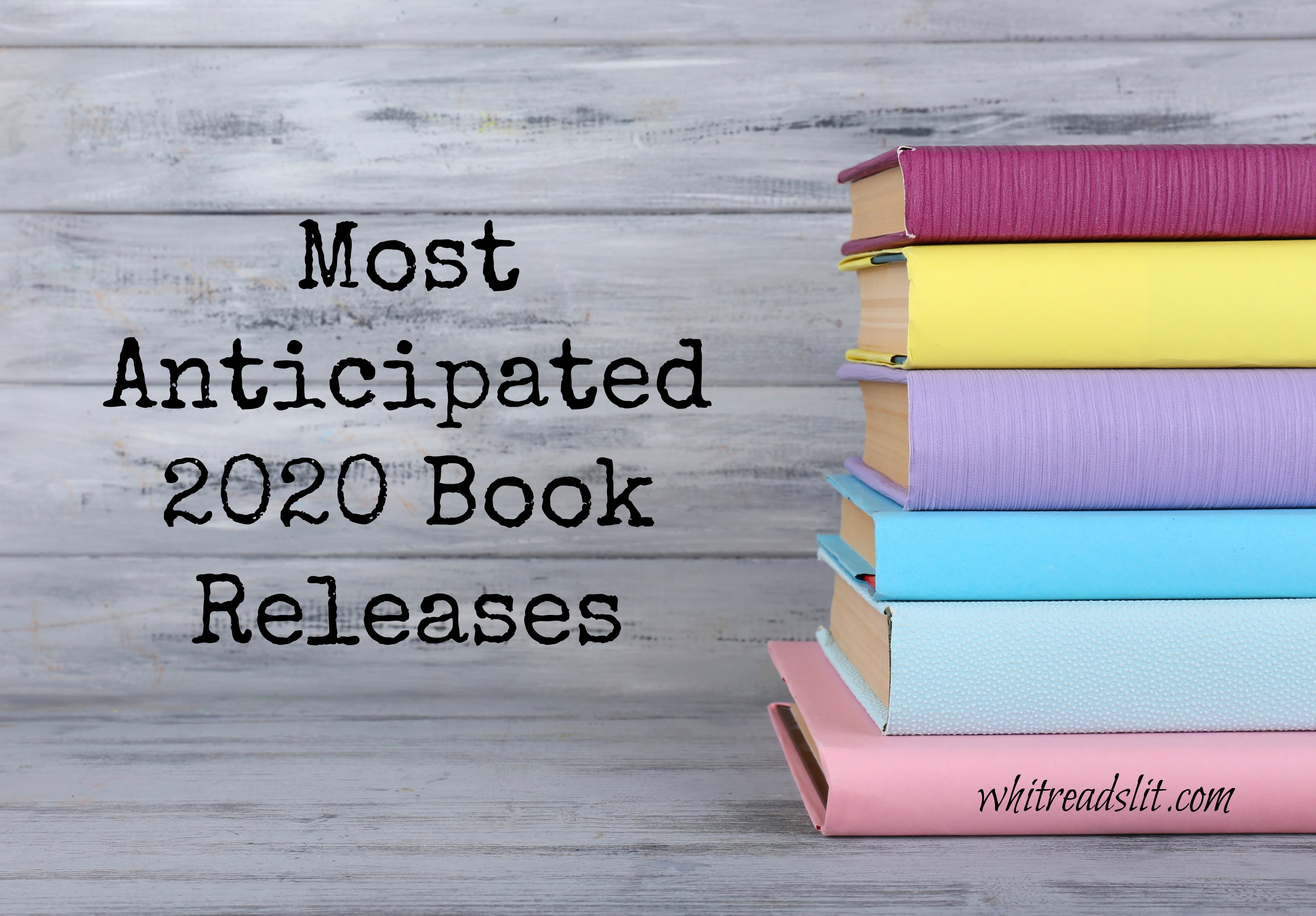 color books on grey wooden background